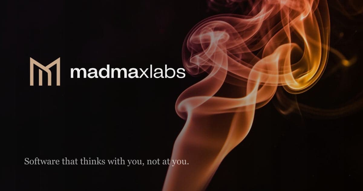 Mad Max Labs name and mark beside a plume of orange light
